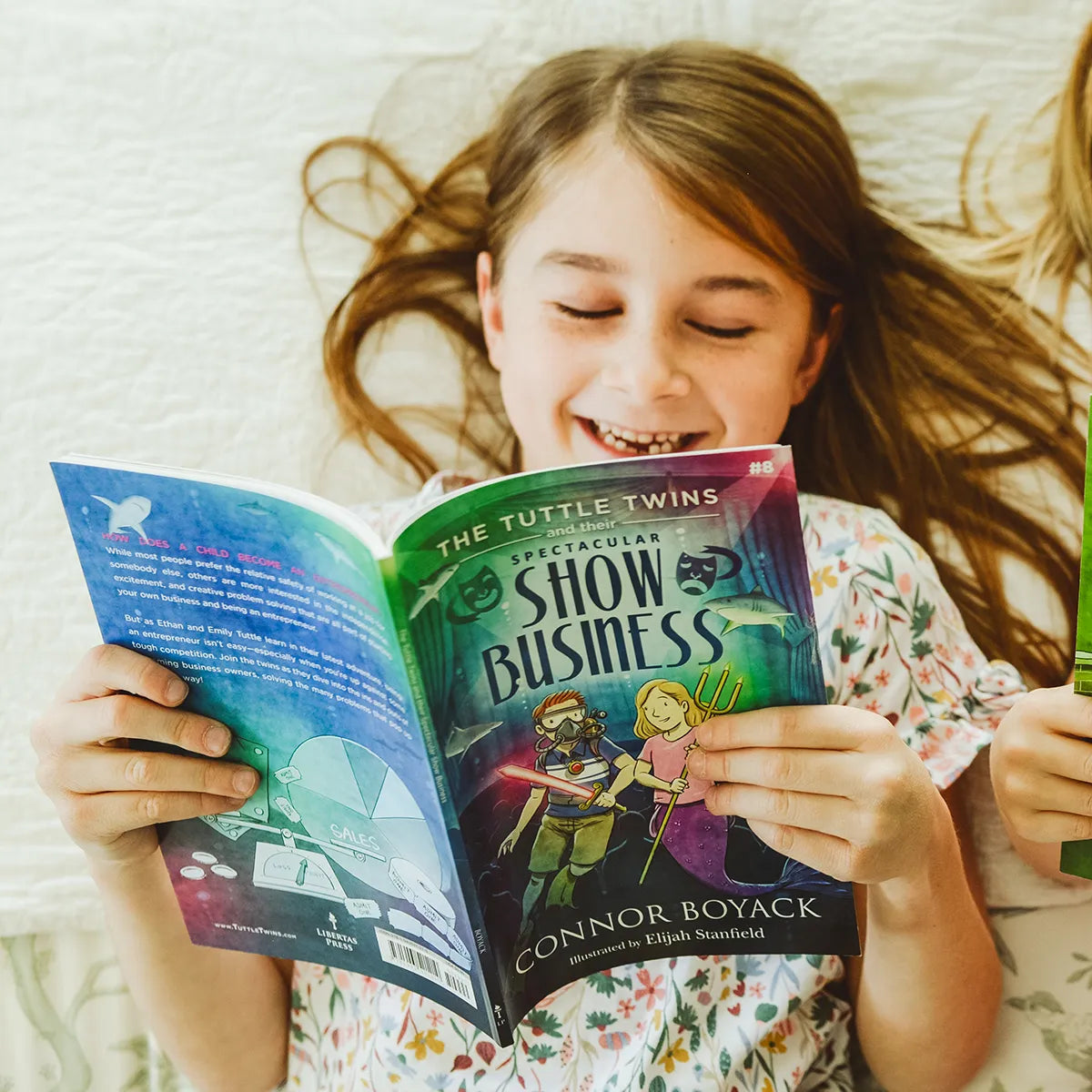 The Tuttle Twins and their Spectacular Show Business